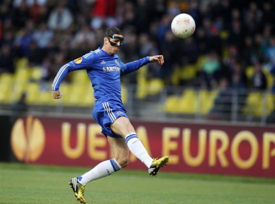 A fourth minute goal from Fernando Torres has given Chelsea a 1-0 lead against Rubin Kazan at half time in Russia and all but secured their place in the Europa League semi-finals.