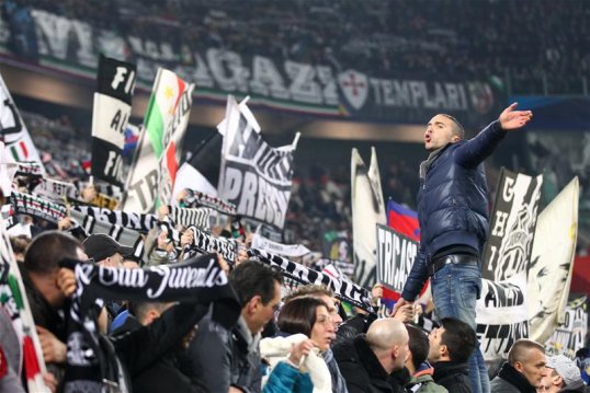 Juventus may be forced to celebrate triumph in this season's Serie A behind closed doors as the club faces up to punishment for fans' racist behaviour during Sunday's 1-0 victory over AC Milan.