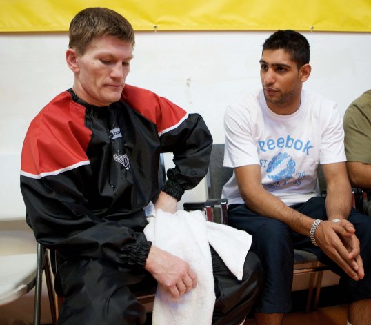 Former WBC light-welterweight champion Amir Khan has not ruled out a potential fight with close friend Ricky Hatton.