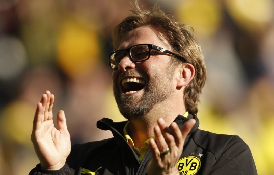 Borussia Dortmund boss Jurgen Klopp has insisted his side will try to enforce their own style on Real Madrid in the first leg of their Champions League semi-final on Wednesday.