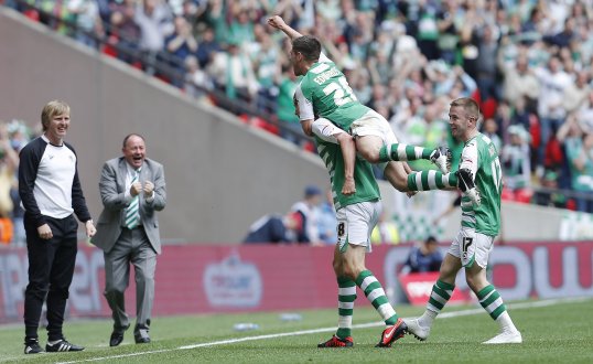 Yeovil Town saw off a late Brentford charge to gain promotion to the Championship this afternoon.