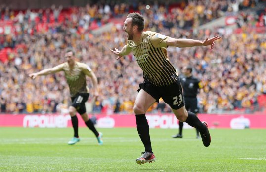 Bradford City ran riot in the first half of their League Two play-off final against Northampton Town and look poised to seal their promotion to League One.