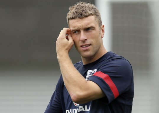 England striker Rickie Lambert will miss this Friday’s clash with Chile, boss Roy Hodgson has confirmed.