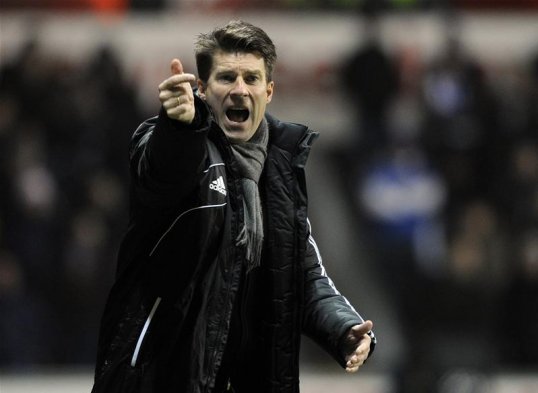 Swansea City manager Michael Laudrup has said that he has no plans to the Welsh club after speculation linked him with Real Madrid.