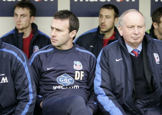 Crystal Palace assistant boss Lennie Lawrence has expressed his sadness at parting company with Dougie Freedman.