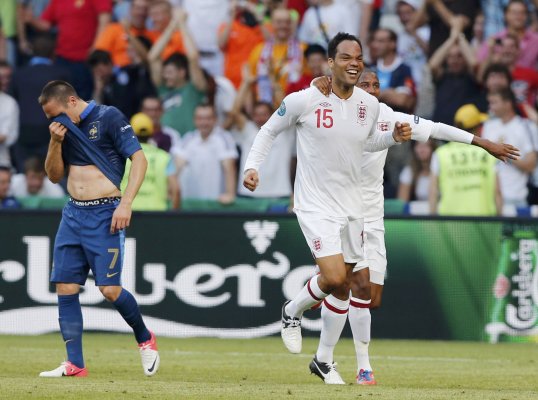 Joleon Lescott believes a struggle for World Cup qualification will benefit England if they reach Brazil 2014.