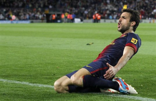 Cesc Fabregas secured a hard fought victory for Barcelona against a determined Levante with a late winner.