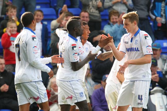 Tranmere managed to stay top of League One today after grinding out a draw against Brentford, while high-flying Gillingham were halted by Rochdale as they lost 2-1.