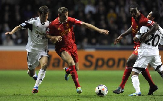 Liverpool midfielder Jordan Henderson is pleased with the way his development as a footballer is going under manager Brendan Rodgers.