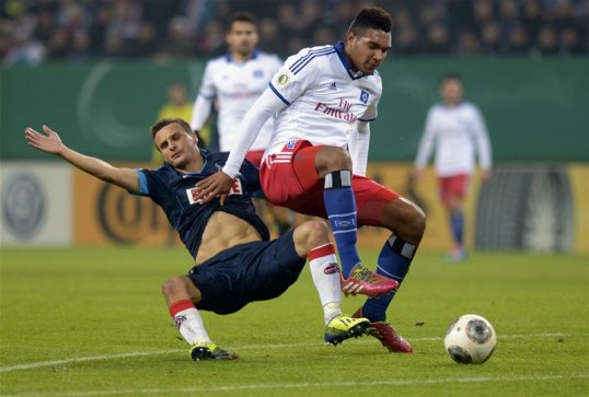 Liverpool have reportedly sent scouts to watch Hamburg's teenage centre-back Jonathan Tah, SportsDirect News understands.