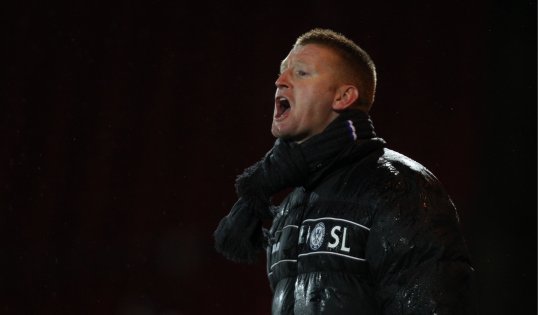 Steve Lomas has dismissed talk linking him with the vacant Burnley job.