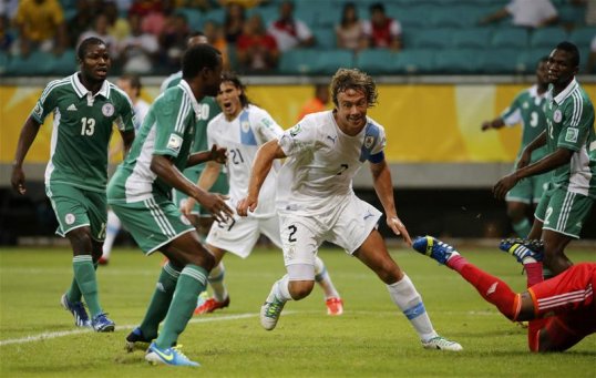 Uruguay's veteran defender Diego Lugano is confident that his side can give Brazil a game in the semi-finals of the Confederations Cup.