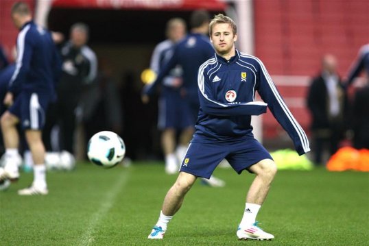 Aston Villa midfielder Barry Bannan has been called up to the Scotland squad for their World Cup qualification ties against Wales and Serbia.