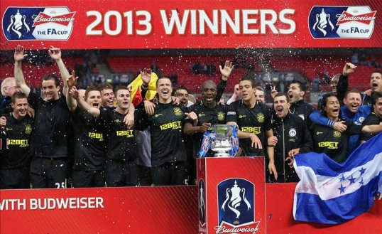 Wigan Athletic manager Roberto Martinez praised his “underdogs'” bravery after winning the FA Cup with 91st minute victory over Manchester City.