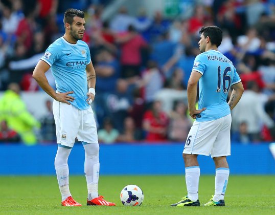 Manchester City striker Alvaro Negredo will partner Sergio Aguero up front against Manchester United at the Etihad Stadium on Sunday.