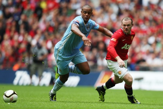 Vincent Kompany cannot wait to go toe-to-toe with an in-form Wayne Rooney in the Manchester derby on Sunday.