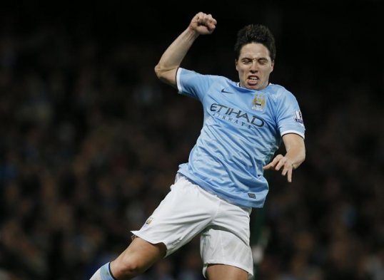 Manchester City midfielder Samir Nasri is confident his side can catch league leaders Arsenal after the Citizens beat Swansea City 3-0 at home on Sunday.