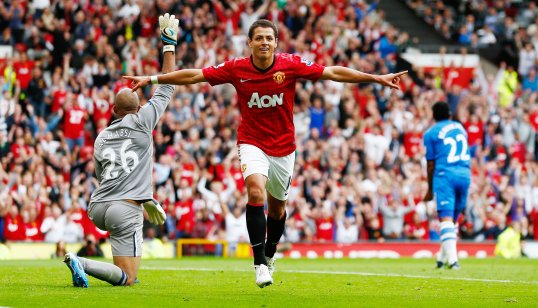 Manchester United thumped Wigan Athletic 4-0 in a performance that came to life in the second half.