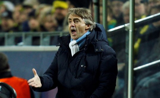 Manchester City manager Roberto Mancini found consolation in being knocked out of both European competitions by conceding it will help their Premier League campaign.