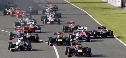 Red Bull Racing driver Sebastian Vettel has created a fifteen second gap between him and second place Felipe Massa whilst Fernando Alonso retired on the first corner.