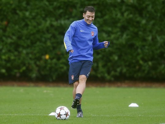 Former Arsenal striker Malcolm Macdonald believes Mesut Ozil has turned the Gunners into genuine title contenders.