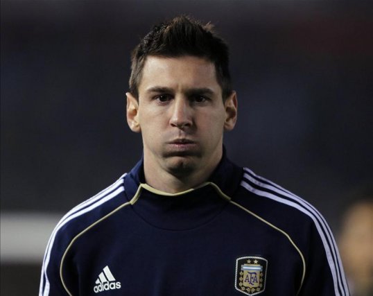 Barcelona's Lionel Messi says he is desperate to win the World Cup with Argentina and claims he is sad that his country have not achieved it yet.