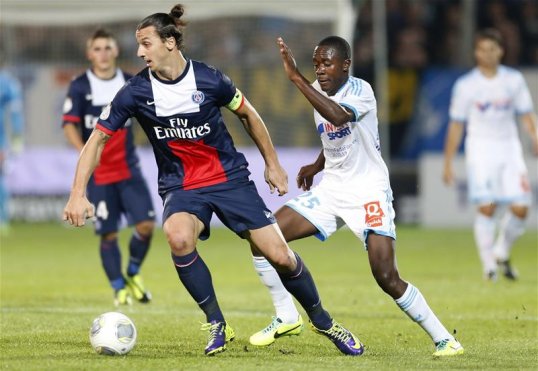 Paris Saint-Germain beat Marseille 2-1 at the Stade Velodrome despite playing over half the game with 10 men.