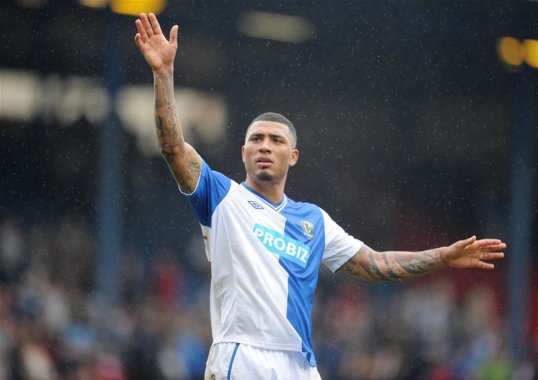 Blackburn Rovers midfielder Colin Kazim-Richards has been charged with a public order offence following claims of a derisory gesture against Brighton over two months ago.