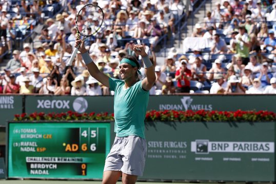 Rafael Nadal edged past Tomas Berdych 6-4 7-5 to book his place in the BNP Paribas Open final at Indian Wells tonight.