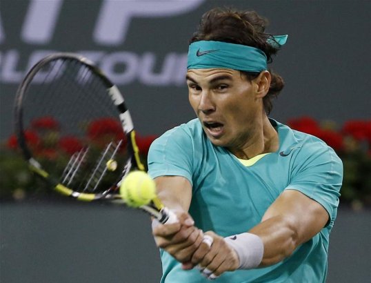 World number five Rafael Nadal has made it through to the last 16 of the Open at Indian Wells after he was given a walkover after Argentinian opponent Leonardo Mayer withdrew.