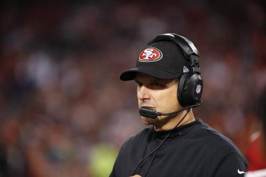 San Francisco 49ers head coach Jim Harbaugh is positive about being in London with his team as they prepare to face the Jacksonville Jaguars at Wembley Stadium on Sunday.