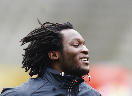 Belgium striker Romelu Lukaku has revealed Everton manager Roberto Martinez called up to congratulate him on sealing qualification for the 2014 World Cup.