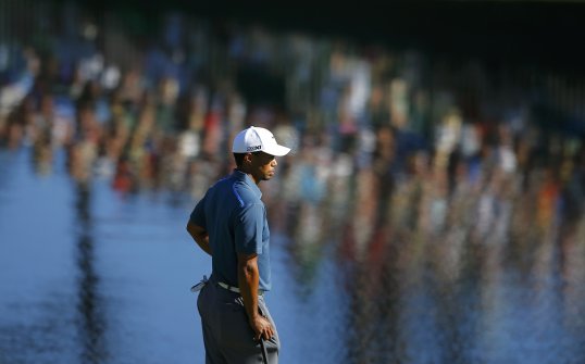 Tiger Woods has insisted he never considered withdrawing from the Masters over claims he took an illegal drop.
