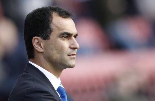 Wigan Athletic manager Roberto Martínez has said he won't abandon the team's passing style despite having only won game this season.
