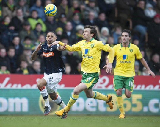 Scott Rendell's 80th minute strike sent Norwich City tumbling out of the FA Cup and secured a memorable win for non-league side Luton Town.