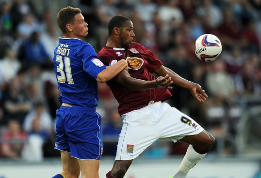 Cardiff City defender Ben Nugent has signed a new contract which will keep him at the club until 2016.