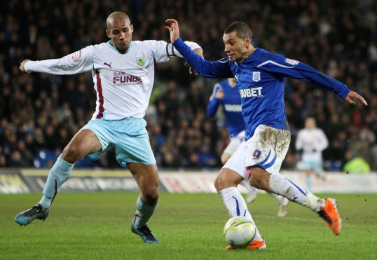 Clarke Carlisle, the chairman of the Professional Footballers' Association, wants Serbia to receive a long ban following their racist abuse of England Under-21 players last night.