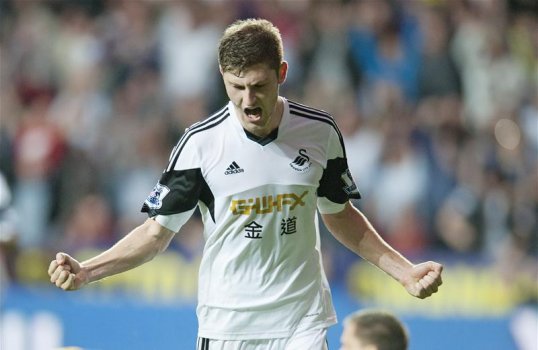 Manchester United boss David Moyes hopes to end his search for a left back by landing Swansea City and Wales international Ben Davies.