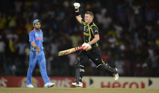 Shane Watson and David Warner both smashed fifties as Australia thrashed India by nine wickets in the World Twenty20 in Colombo