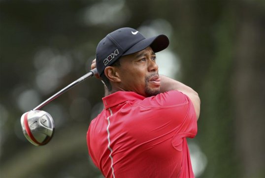 Tiger Woods claims he is ready for the challenge of the Open Championship despite aggravating an elbow injury during the US Open last week.