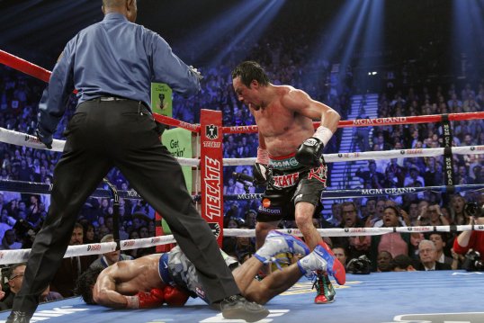 Juan Manuel Márquez knocked out Manny Pacquiao in the two fierce rivals’ fifth bout in Las Vegas.