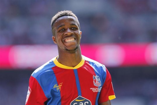 Crystal Palace chairman Steve Parish has played down speculation linking the club with an immediate loan move for Manchester United bound Wilfried Zaha.