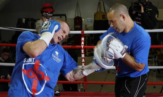 Boxer George Groves has split with trainer Adam Booth just two-months before his title fight against Carl Froch.