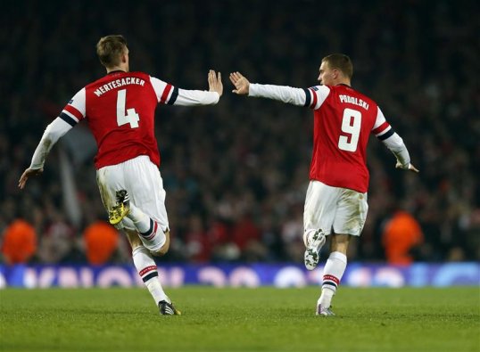 Arsenal forward Lukas Podolski is a doubt for his side’s Champions League second leg with Bayern Munich on Wednesday.