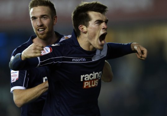 Portsmouth have signed striker John Marquis from Millwall on a one-month loan deal.