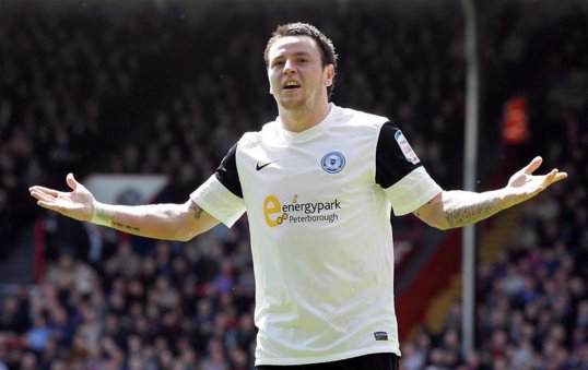 Peterborough United have revealed the cause of their 2-0 home defeat on Saturday – a £2 million bid for striker/winger Lee Tomlin on the day of the match from Celtic.