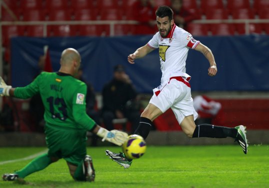 Sevilla president José Maria del Nido says his club have rejected a £13 million bid for striker Alvaro Negredo.