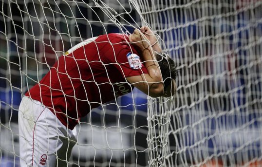 Nottingham Forest will be without striker Simon Cox for two months after the player sustained an ankle injury.