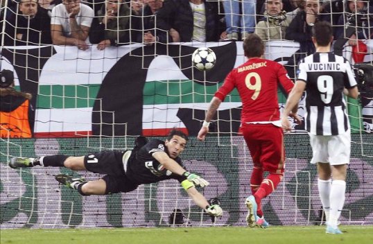 Bayern Munich striker Mario Mandžukić is confident that the German side can win a historic treble this season after they secured their place in the Champions League semi-finals on Wednesday.