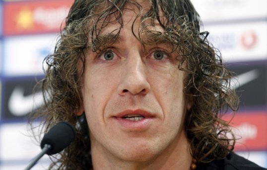 Barcelona captain Carles Puyol has said he is happy with the Champions League last 16 draw against AC Milan.